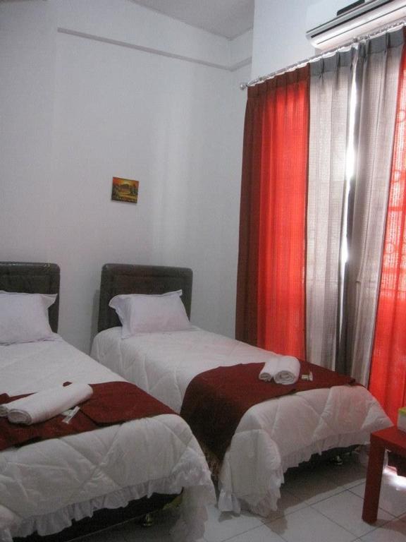 Capsule Homestay Surabaya Bilik gambar